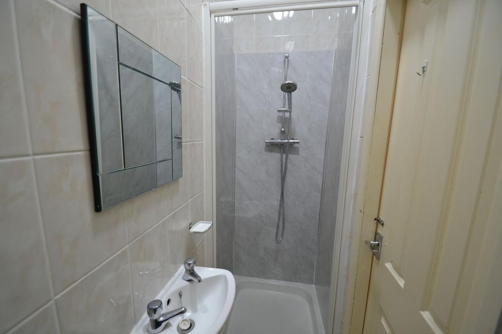 A clean, well-maintained bathroom with a modern...