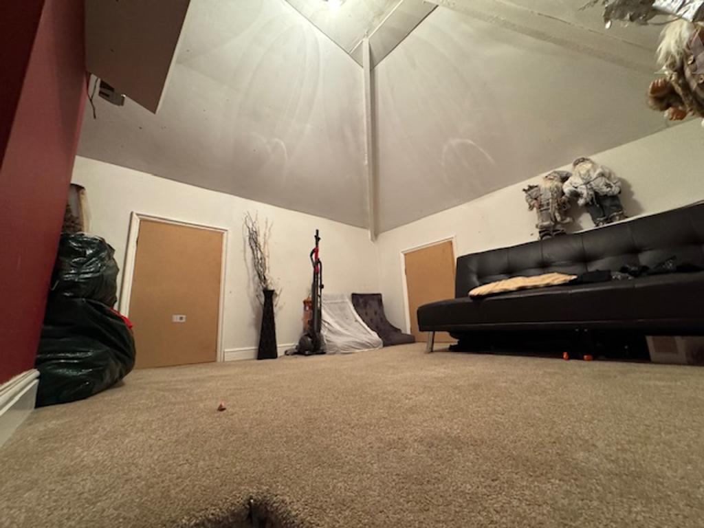 62 Elmfield Road Boraded Attic room.jpeg