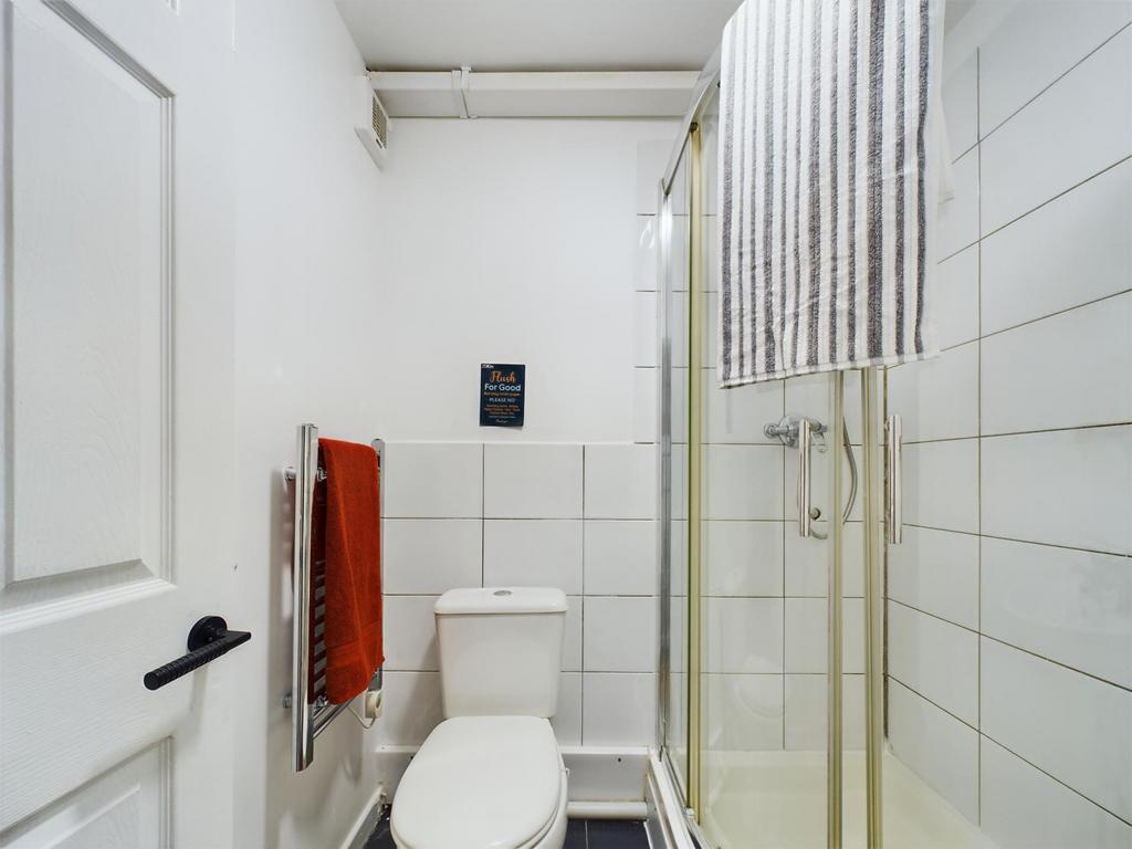 A clean and well-maintained bathroom with a lar...