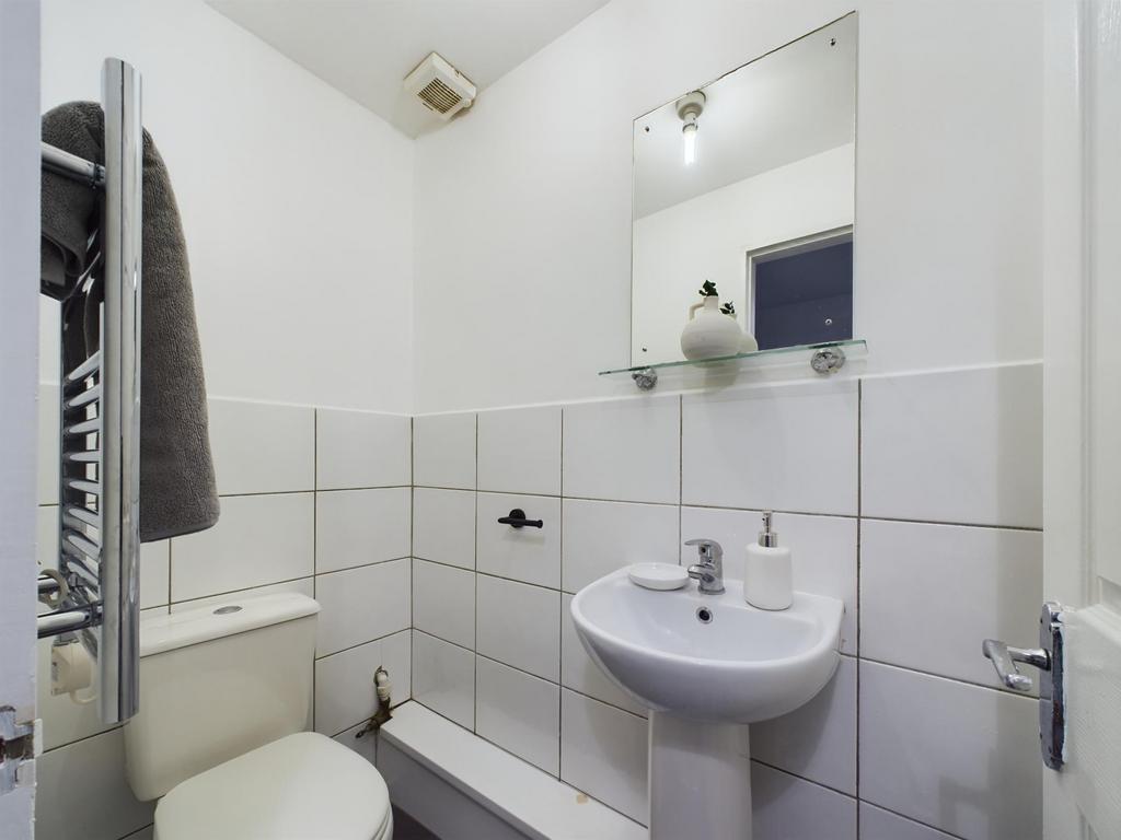 A clean and well-maintained bathroom with a toi...