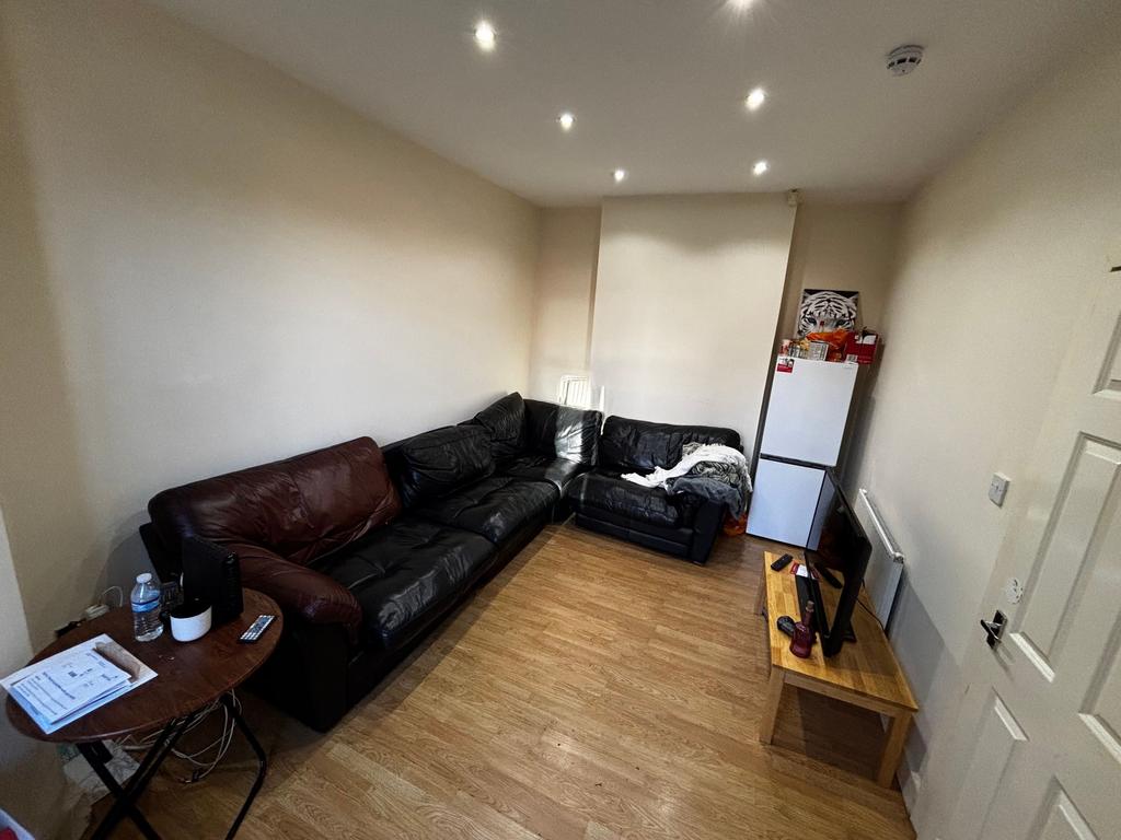 Comfortable lounge with an L-shaped leather sof...