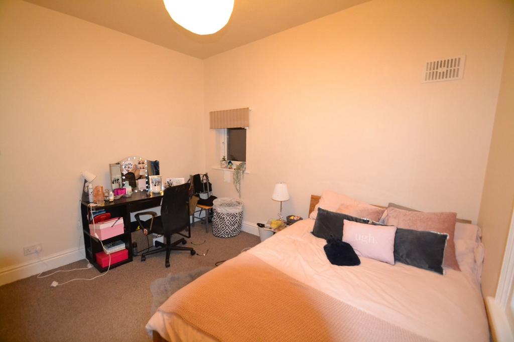 A cozy and functional living space featuring a ...