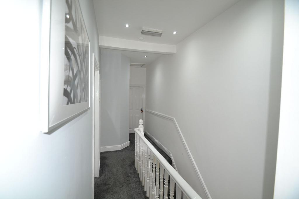 Bright, freshly painted upper landing and stair...