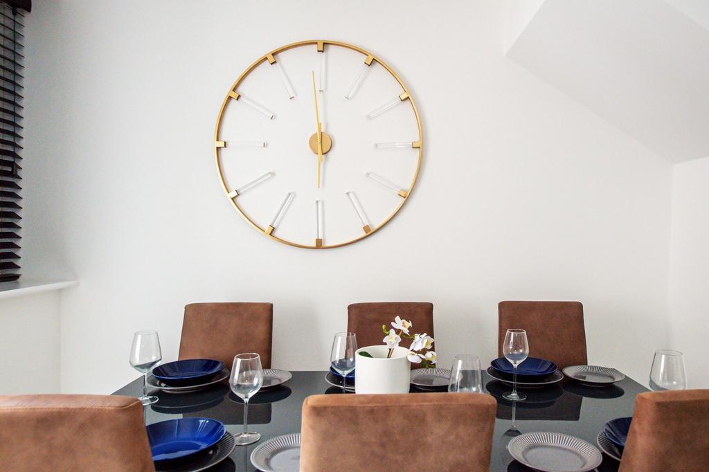 Modern dining area with a stylish black table s...