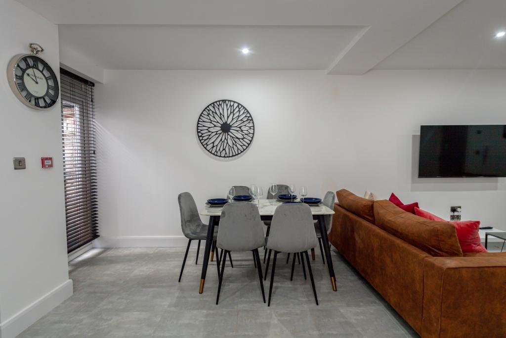A spacious and well-maintained living room feat...