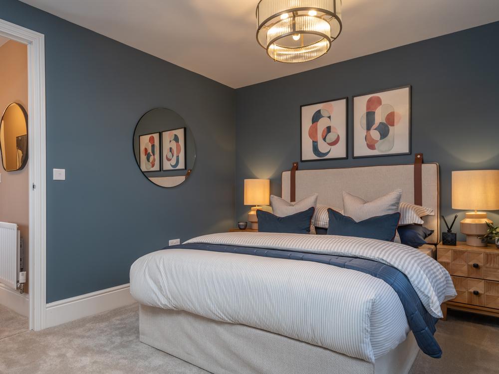 Bedroom 2 featuring a double bed and bedside...