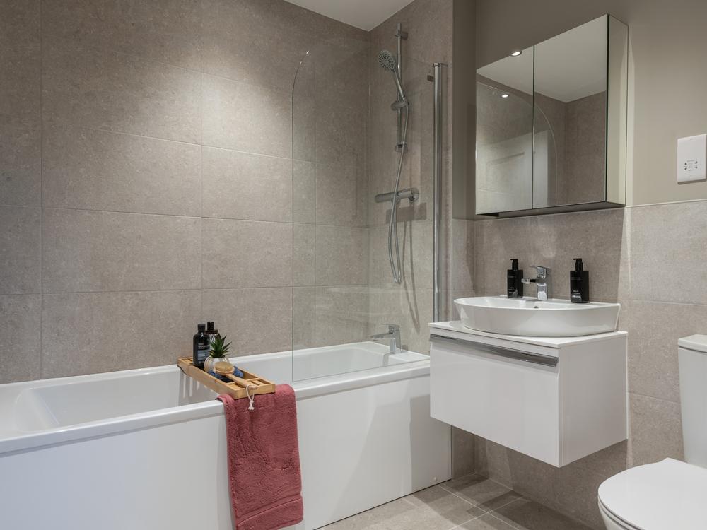Family bathroom with a nice sized bath, sink,...