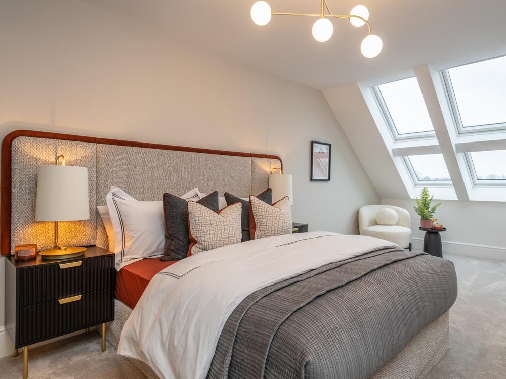 Showcasing the large sophisticated main bedroom...