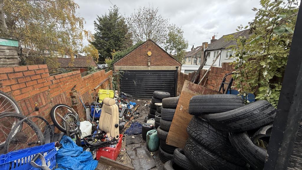 External image of garage through gates