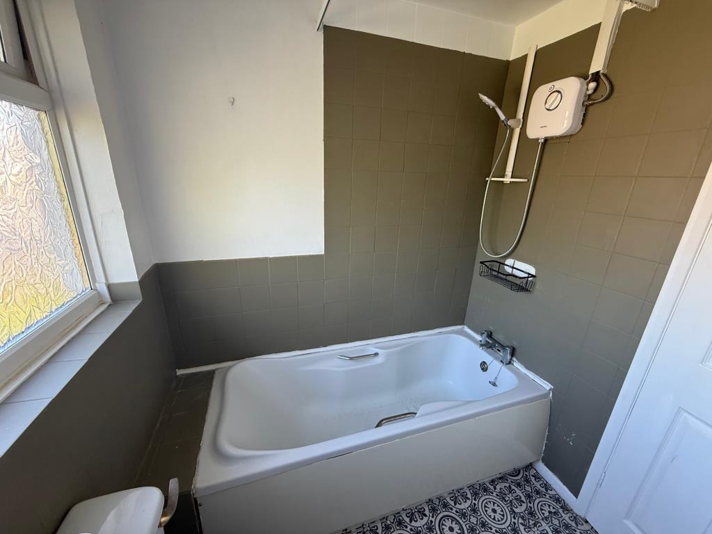 Bathroom with overhead shower