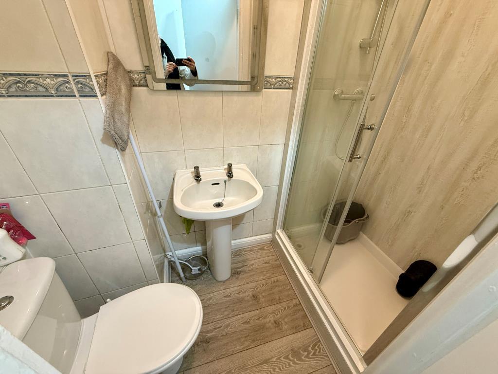 Flat one shower room with W.C.