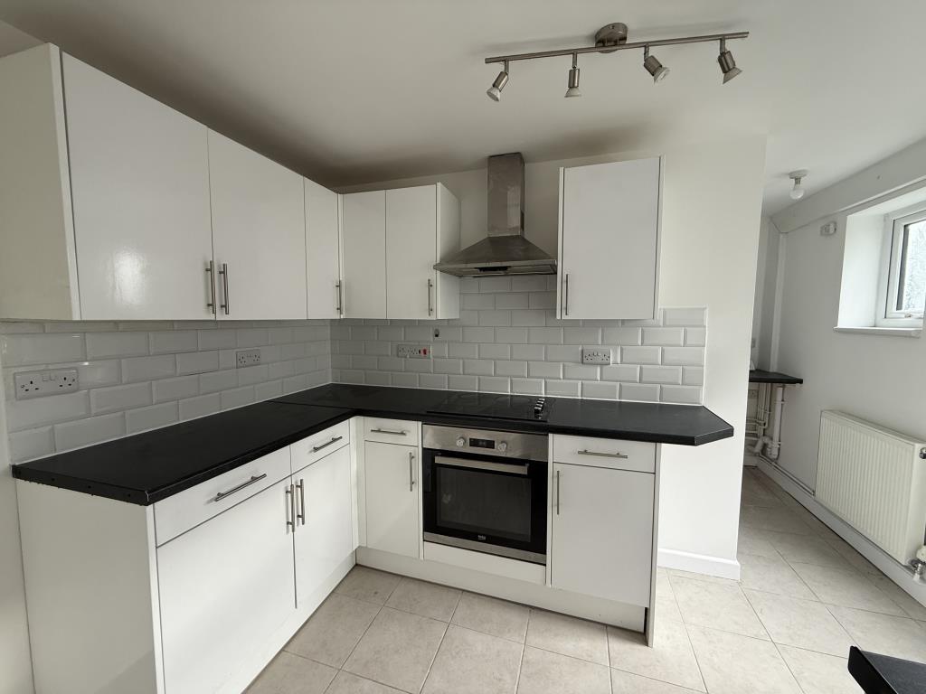 Modern fitted white kitchen