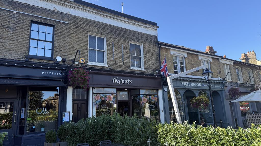 External image of shop and flat above from street