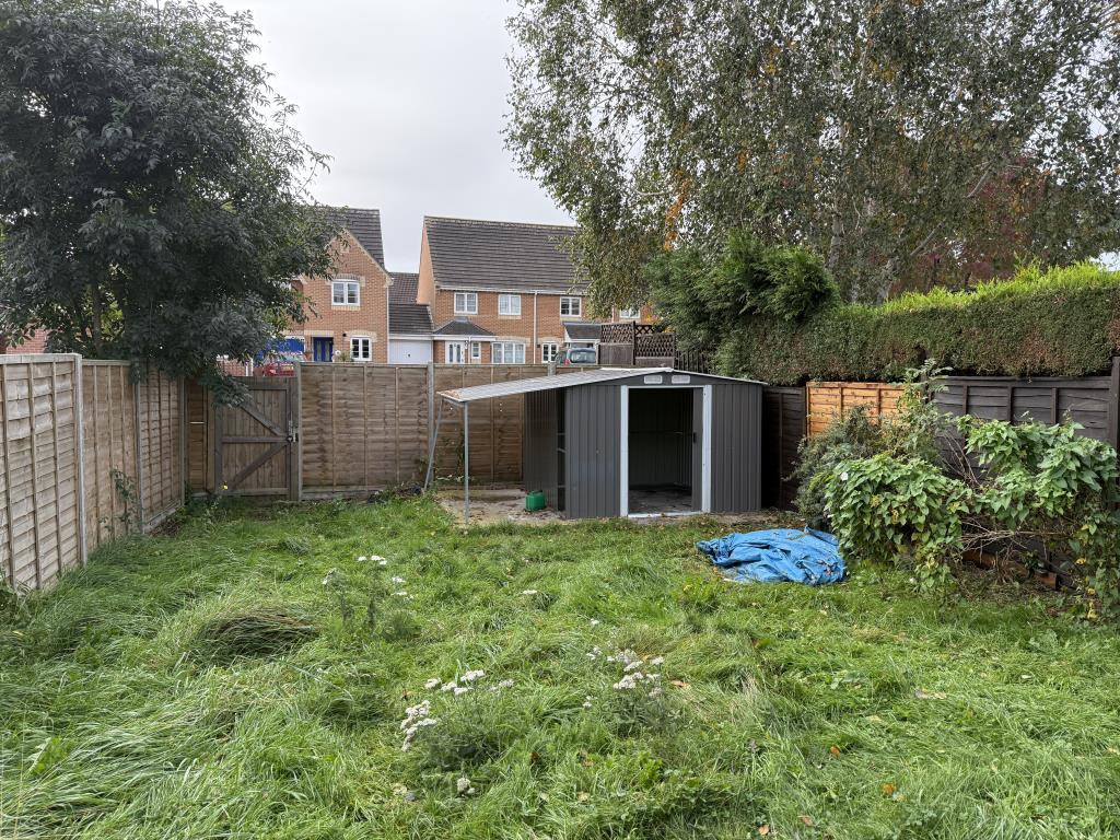 Garden with grass and fenced boundaries
