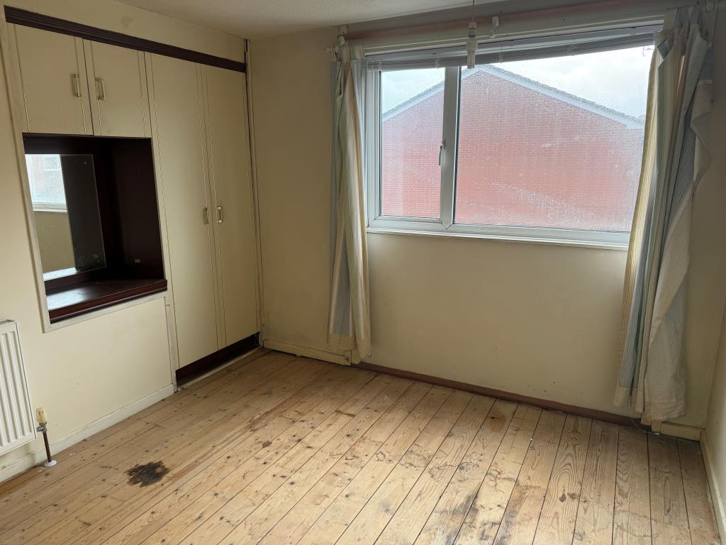 Main bedroom with front window