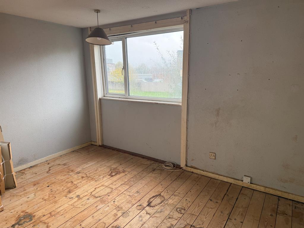 Second bedroom with rear window