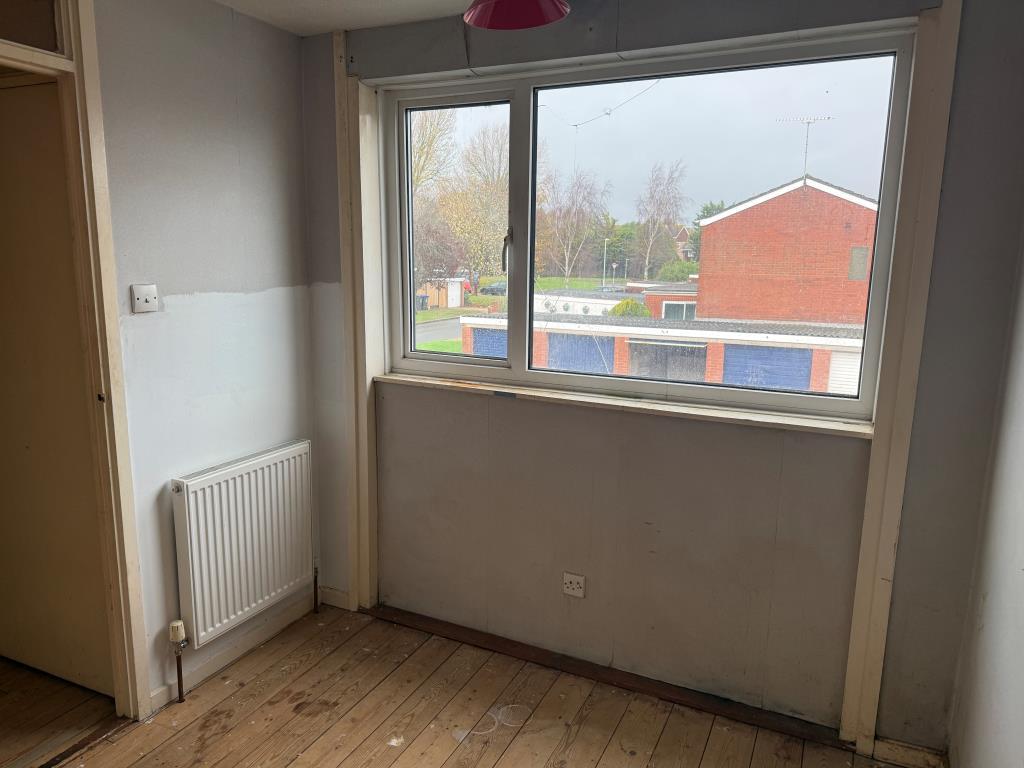 Third bedroom with rear window