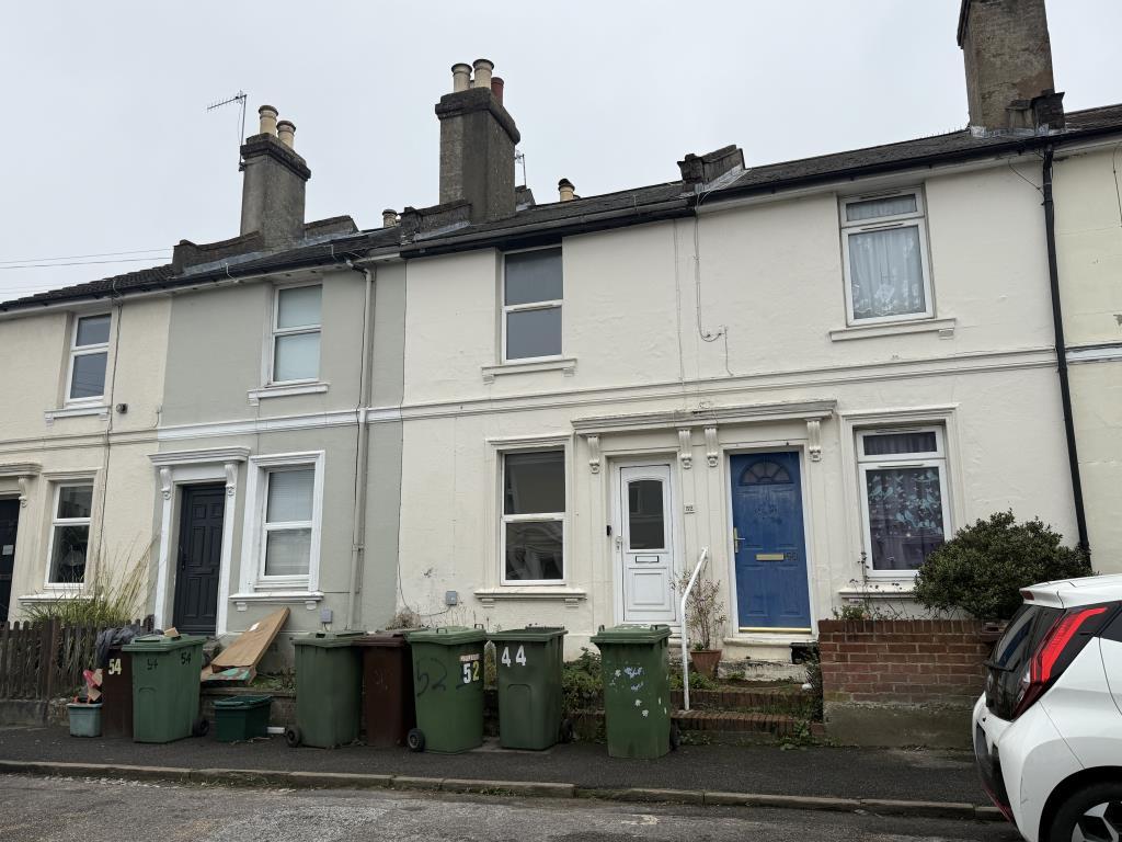 Front View of House in Need of Improvement