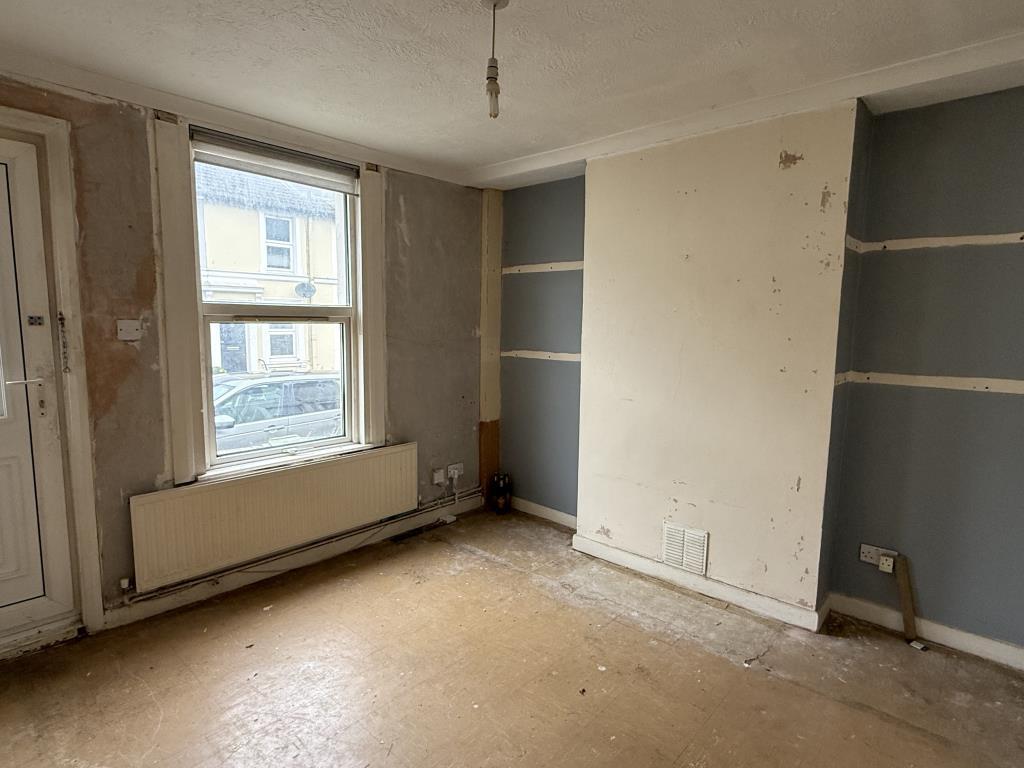 Living Room in House in Need of Improvement