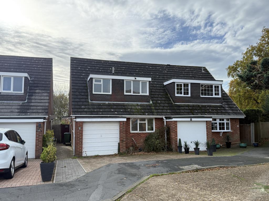 Semi-detached house with garage and driveway