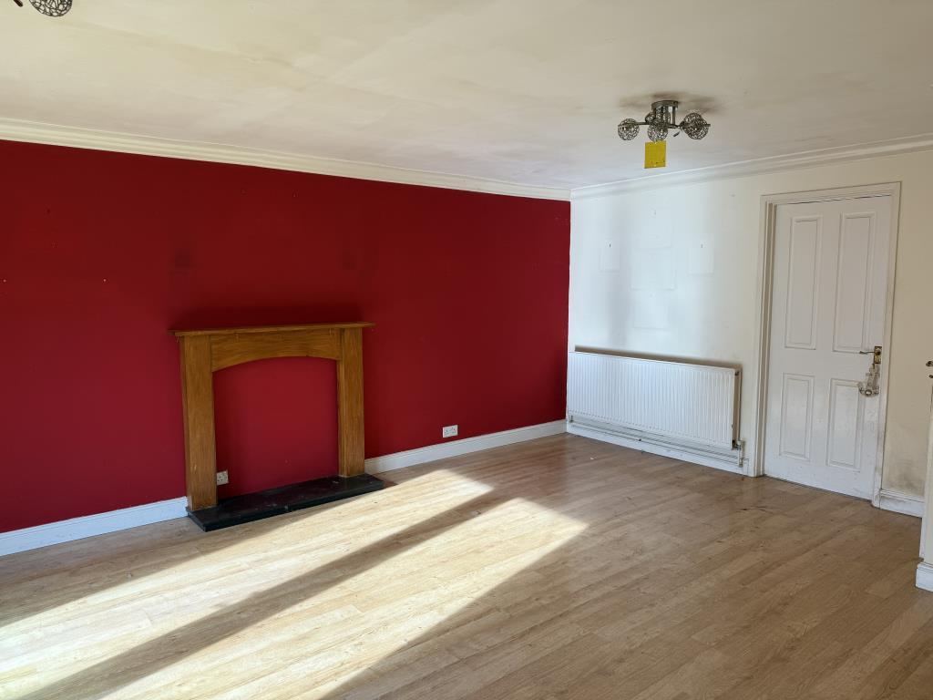Living room with wooden effect flooring