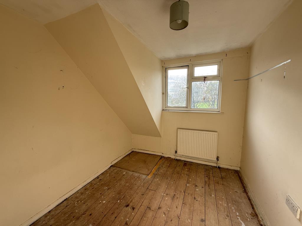 Bedroom three at rear of property