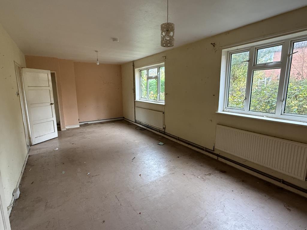 Living Room-Dining Room in Semi in need of Refurbi