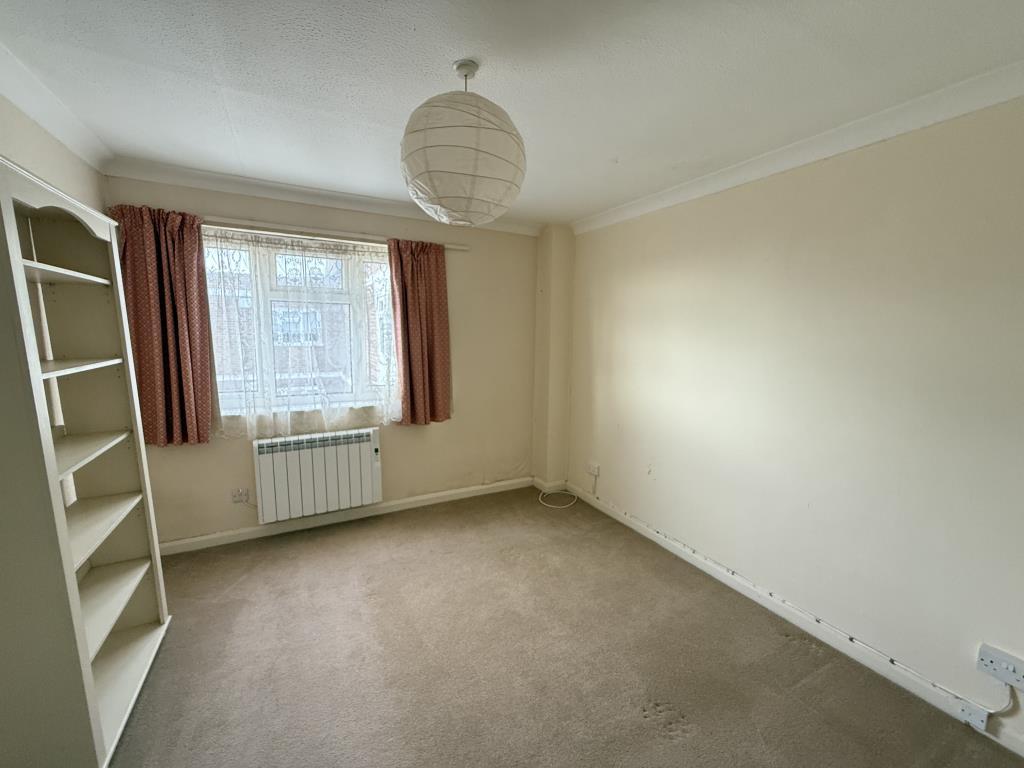 Bedroom one with fitted carpet and painted walls