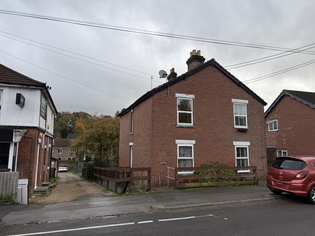 Semi detached house with fenced boundary