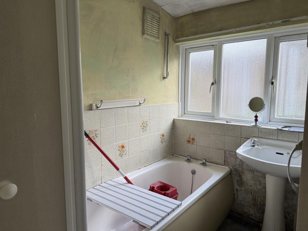 Bathroom with bath and shower