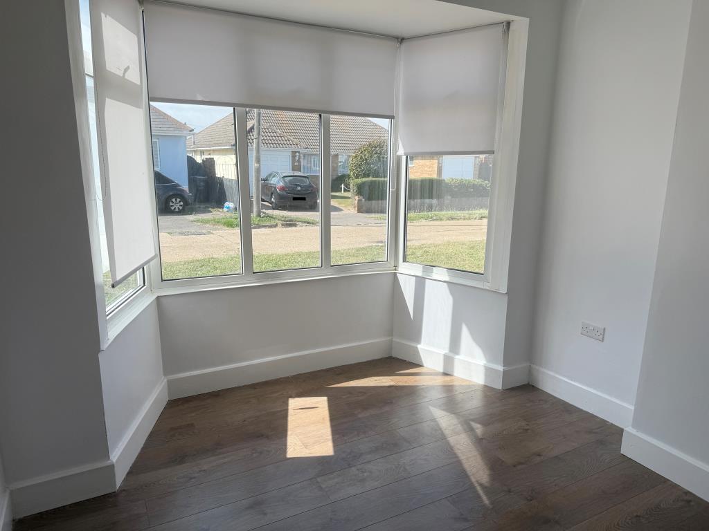 Main bedroom with window overlooking Slindon Avenu