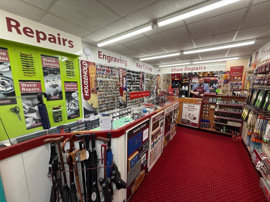 Shop front and sale area in Timpsons