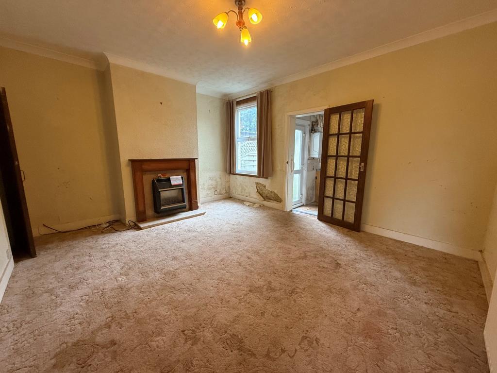 Dining room with storage, window and access into k