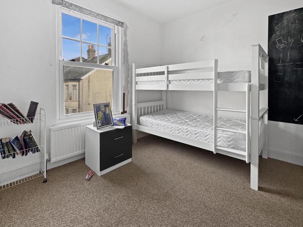 Bedroom with sash window