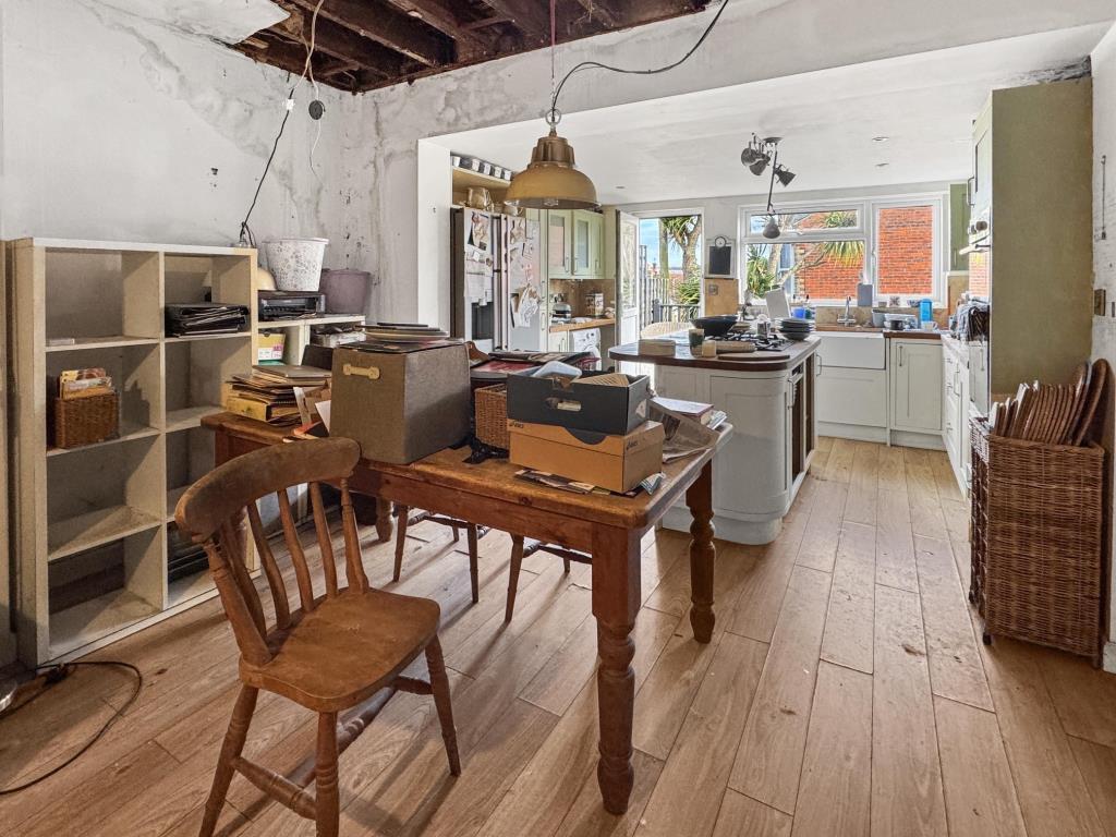 Kitchen/Dining Room with internal roof leak
