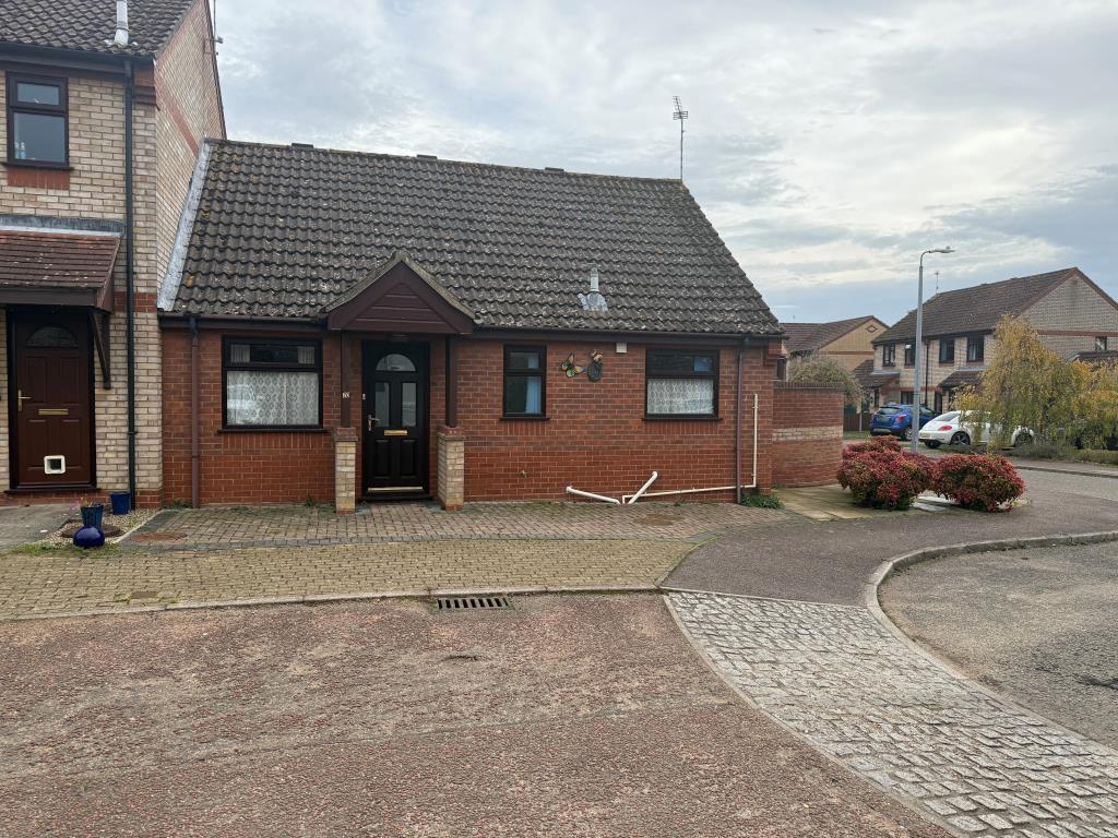 Front shot of end of terrace bungalow