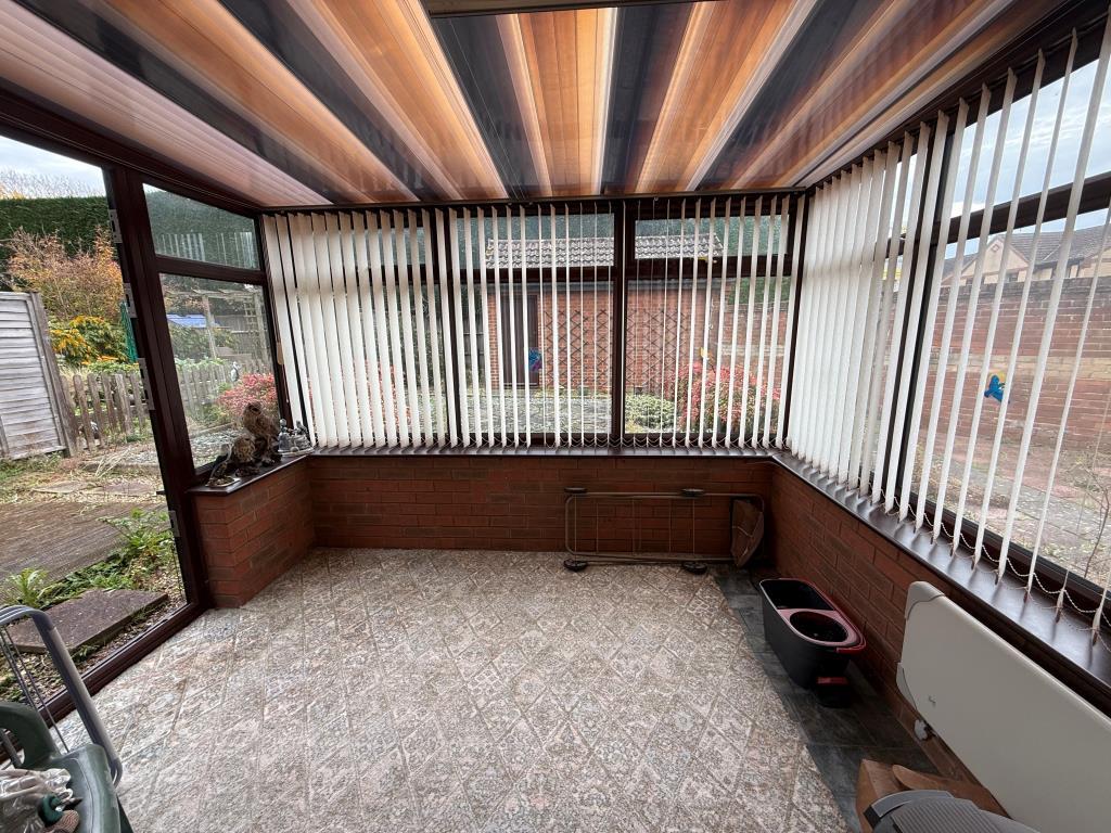 Brick built conservatory with windows all round