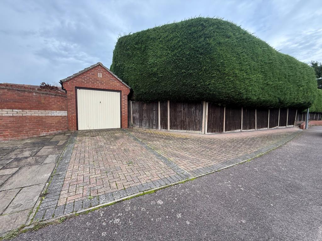 Garage with off road parking for multiple vehicles