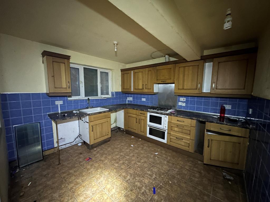 Kitchen with door to back garden
