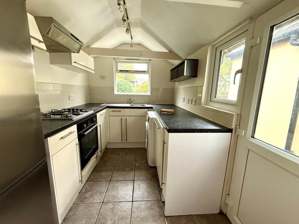 Kitchen with access to garden