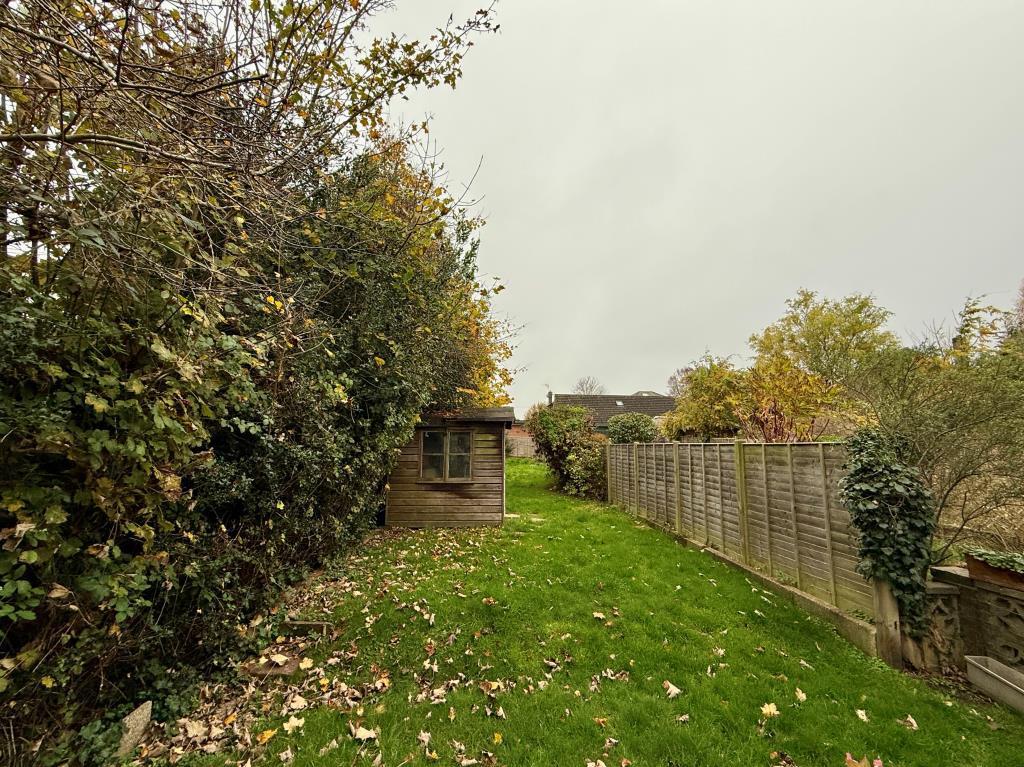 Garden to rear with shed