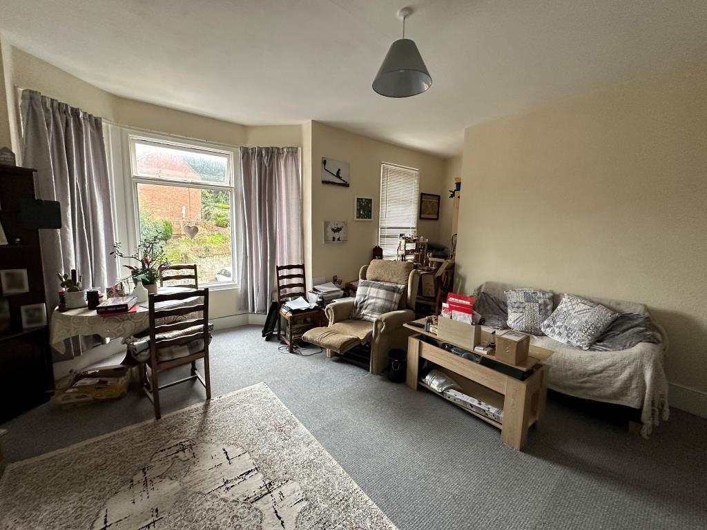 Living room with bay window overlooking Nelson Roa