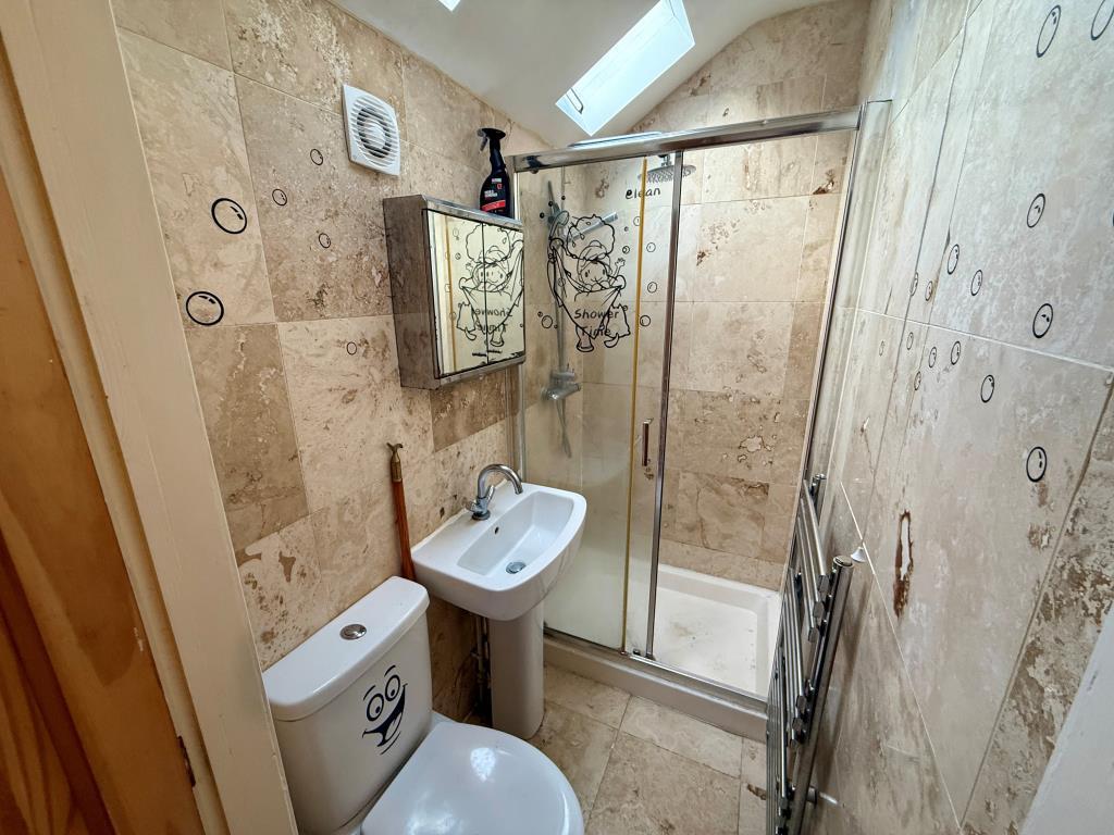 En-suite shower room with W.C.