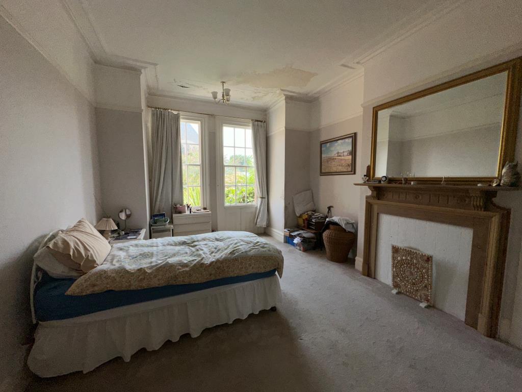 Main bedroom with access into the garden