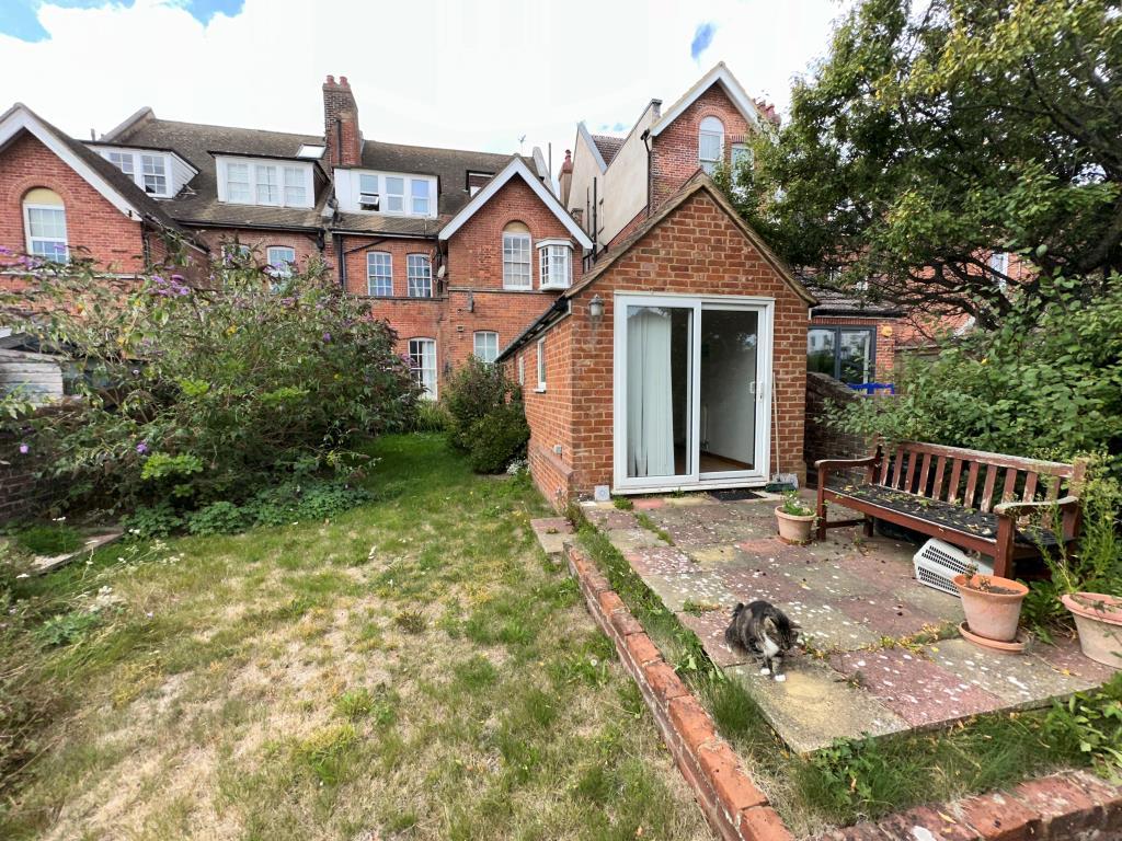 Back of property including garden