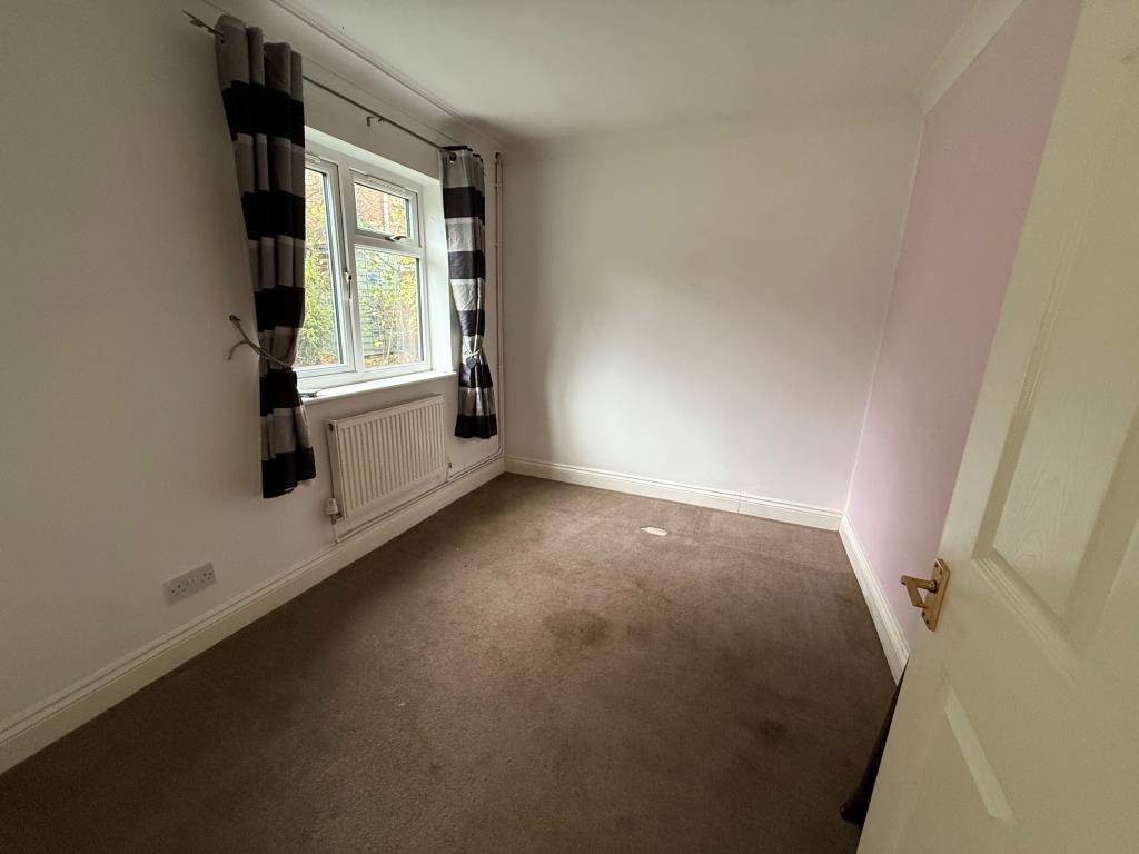 Second bedroom showing window