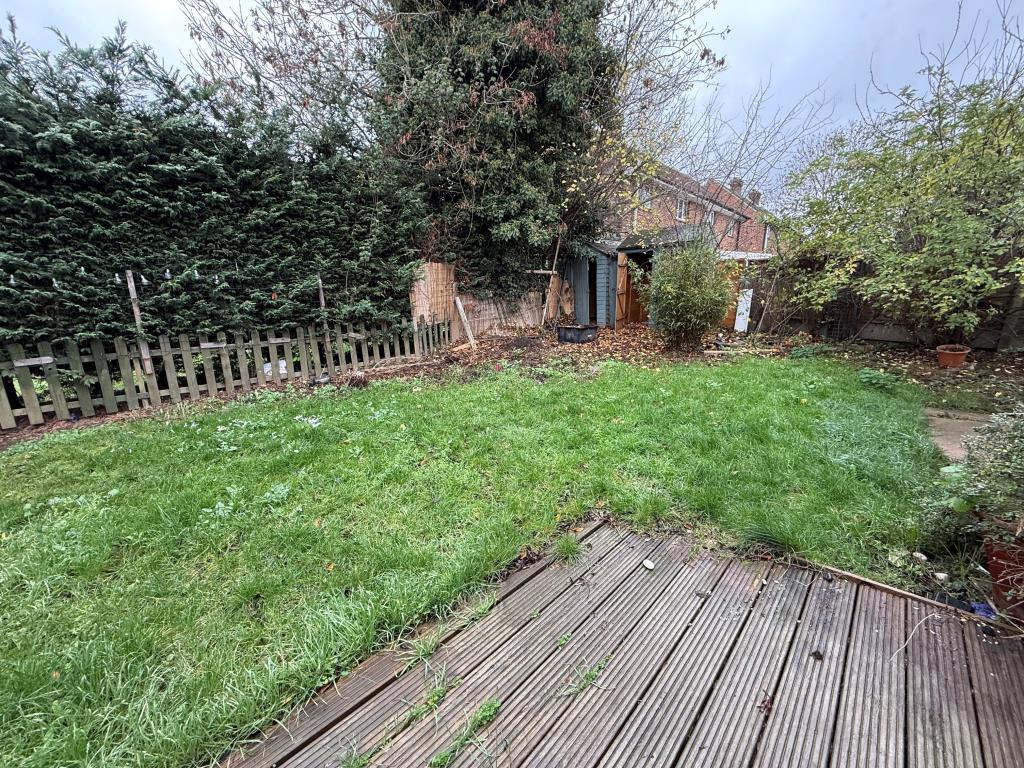 Rear space including decking and grass