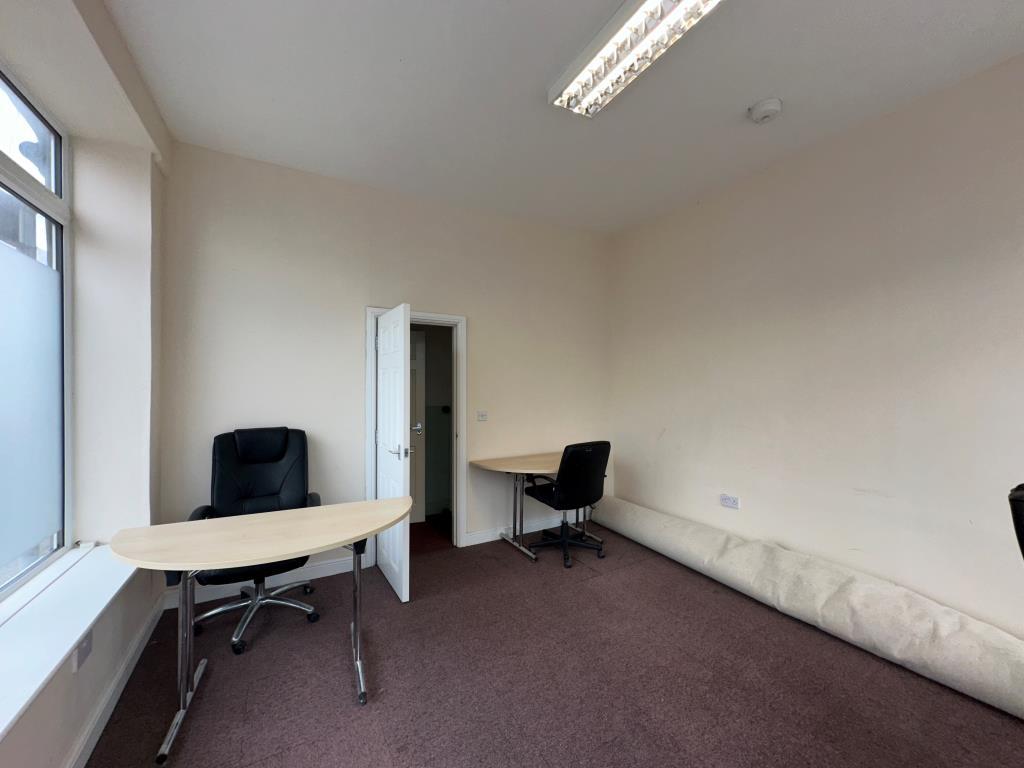 Internal view showing door to staff area and w.c.