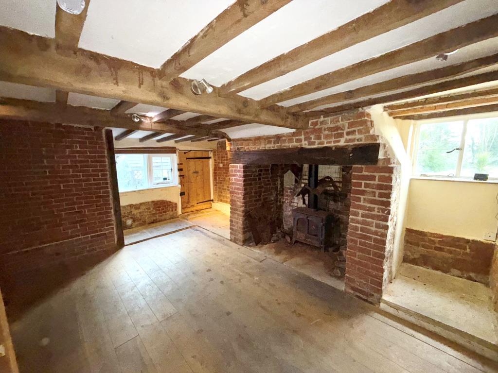 Living room with inglenook fireplace