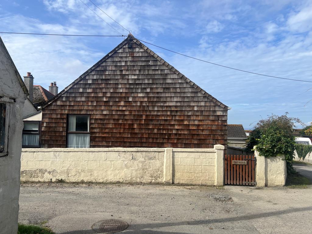 Front elevation with drive to side